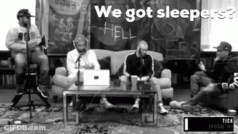 Men Sitting Around Microphone GIF