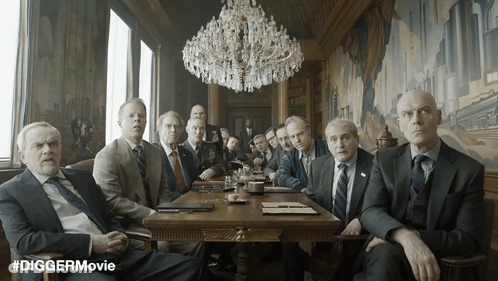 Men Sitting Around Table Diggermovie GIF