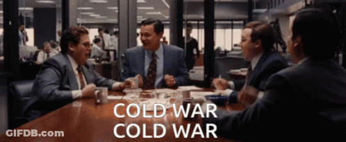 Men Sitting Around Table Saying Cold War GIF
