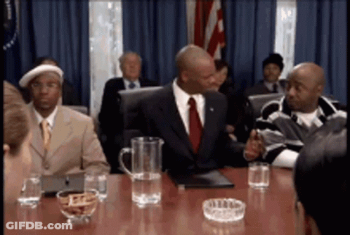 Men Sitting Around Table With Pitcher Of Water GIF