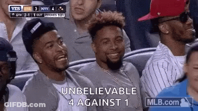 Men Sitting In Baseball Stands GIF