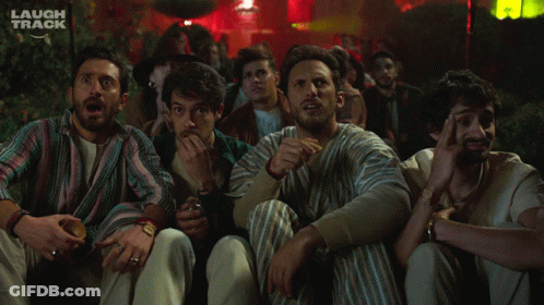 Men Sitting In Front Of Laugh Track GIF