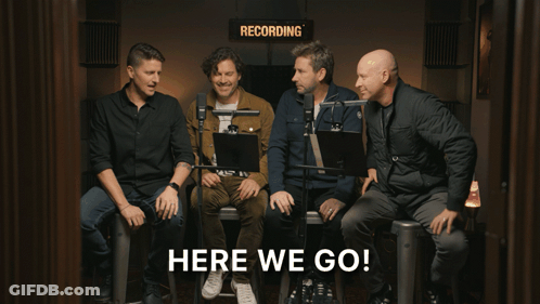 Men Sitting In Front Of Recording Sign GIF