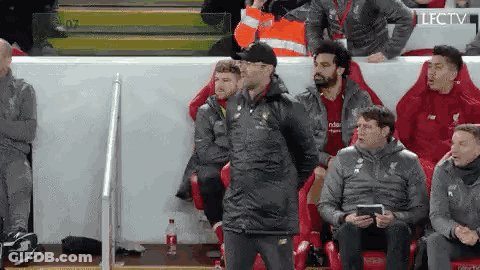 Men Sitting In Stadium Watching Soccer Match GIF