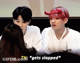 Men Sitting Next To Each Other With Red Bandana GIF