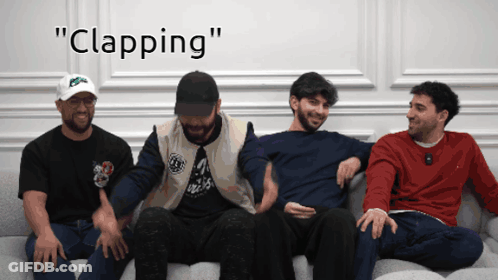 Men Sitting On Couch Clapping GIF