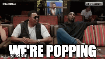 Men Sitting On Couch We're Popping GIF