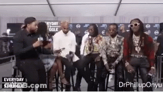 Men Sitting On Stools In Room GIF