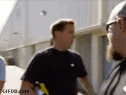 Men Standing And Talking GIF