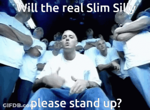 Men Standing Around Man In White Shirt Saying Will The Real Slim Silly Please Stand Up GIF