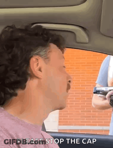 Men Standing Around Table With Arms Around Each Other GIF