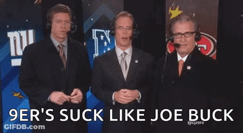 Men Standing In Front Of 9Ers Suck Like Joebuck Sign GIF