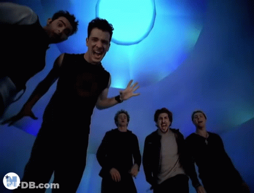 Men Standing In Front Of Blue Light With N GIF