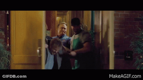 Men Standing In Front Of Door GIF