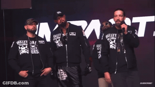 Men Standing In Front Of Impact Sign GIF