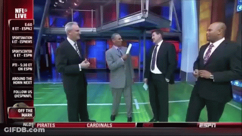 Men Standing In Front Of NFL Live Screen GIF