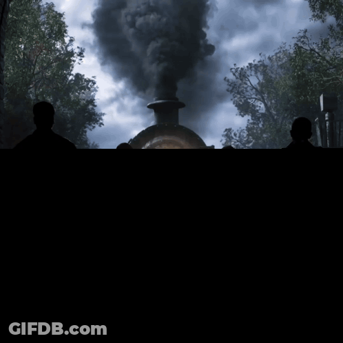 Men Standing In Front Of Train GIF