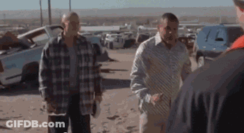 Men Standing Next To Cars GIF