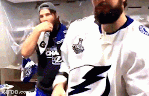 Men Standing Next To Each Other GIF