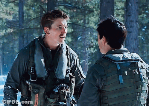 Men Standing Next To Each Other GIF