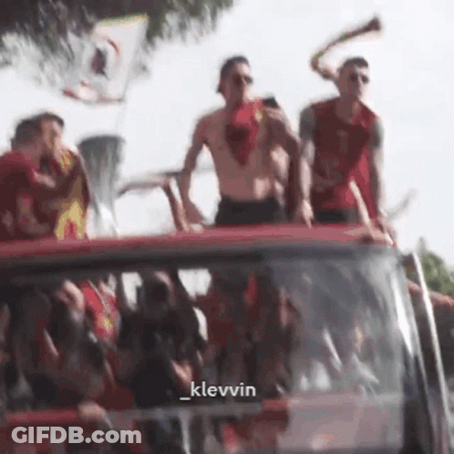 Men Standing On Red Van Klevvin GIF