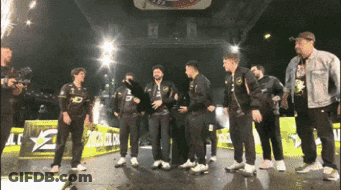 Men Standing On Stage With LG Sign GIF
