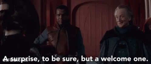Men Standing Together Saying A Surprise To Be Sure But A Welcome One GIF
