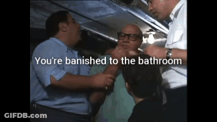 Men Standing With Banishment Message GIF