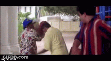 Men Standing With Head Hold GIF