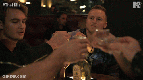 Men Toasting With Tequila Bottle GIF