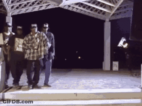 Men Under Gazebo One In Plaid Shirt GIF