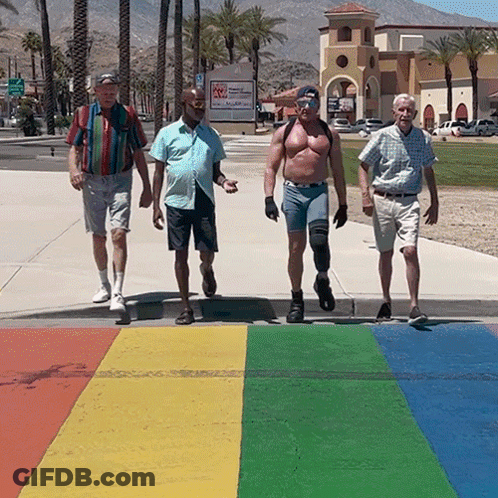 Men Walking Across Rainbow Crosswalk GIF