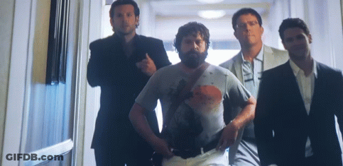 Men Walking Down Hallway GIF