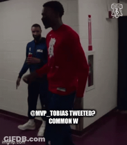 Men Walking Down Hallway GIF
