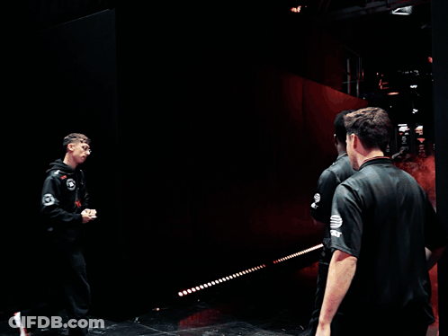 Men Walking In Smoke-Filled Room GIF