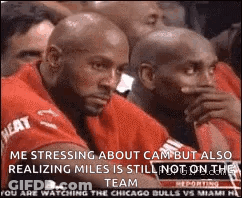 Men Watching Basketball One Wearing Heat Shirt GIF