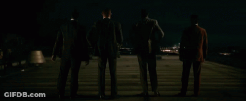 Men Watching Fireworks In The Dark GIF