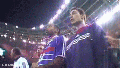 Men Watching Game In Stadium GIF