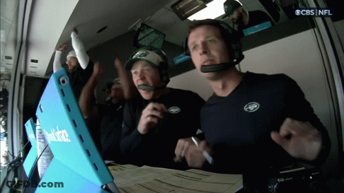Men Watching Game On CBS And NFL GIF