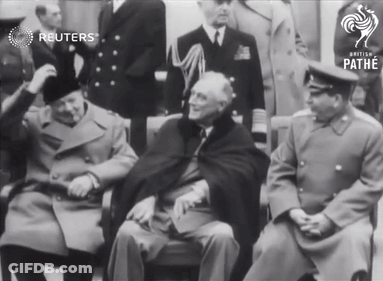 Men Watching Reuters Screen GIF
