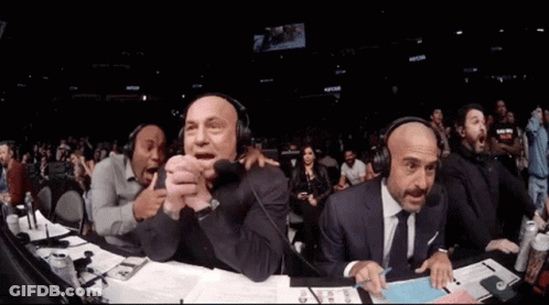 Men With Headphones Watching Boxing Match GIF
