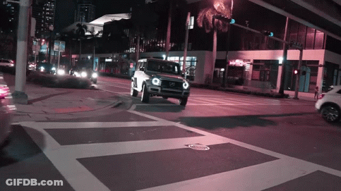 Mercedes Driving At Night With Purple Light GIF