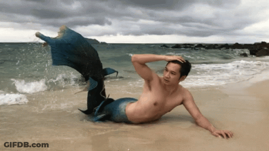 Mermaid Guy On Beach GIF