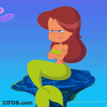 Mermaid Sitting On Rock Crossed Arms GIF