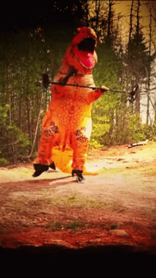 Metal Rocker Dinosaur Costume GIF