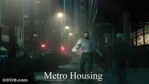 Metro Housing Poster Man Running Down Street GIF