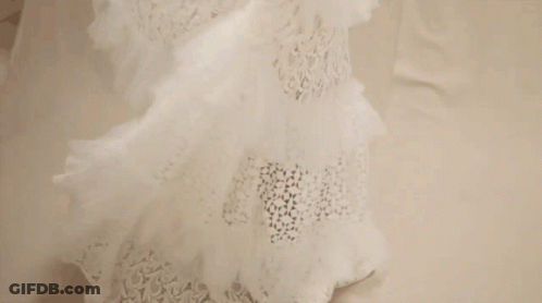 Metro Magazine Woman In White Dress GIF