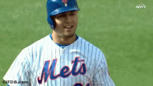 Mets Baseball Player In Blue Helmet And Striped Jersey GIF