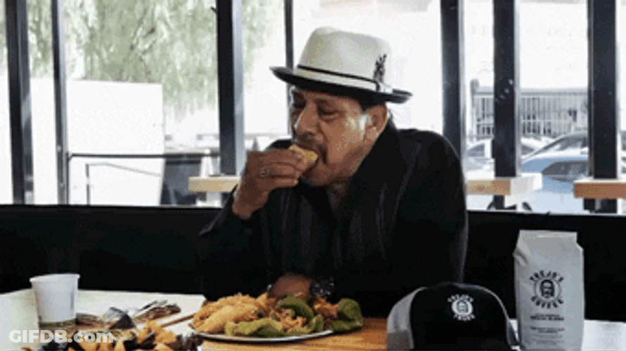 Mexican Danny Trejo Eating Burrito GIF