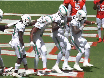 Miami Dolphins Football Players Dancing On Field GIF